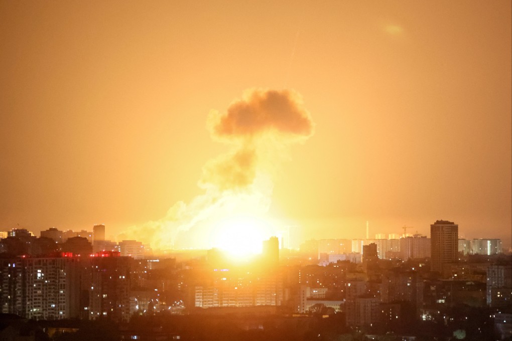 An explosion lights up the sky over Kyiv during a Russian missile and drone strike in Ukraine in April. Photo: Reuters
