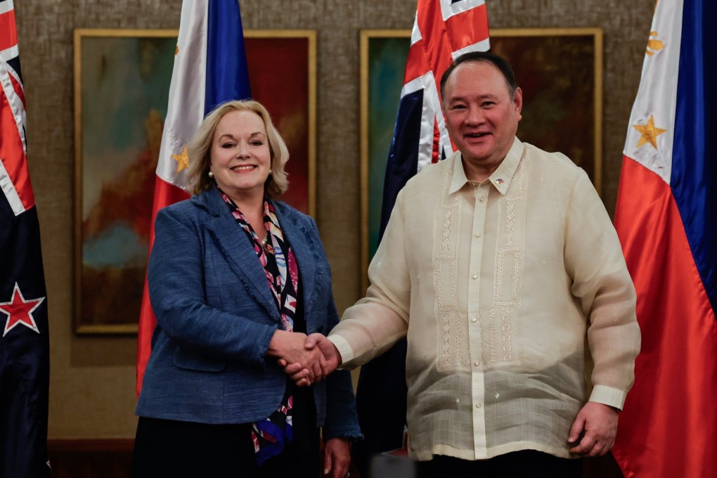 New Zealand’s Defence Minister Judith Collins (left) and Philippine Defence Secretary Gilberto Teodoro Jnr shake hands after a bilateral meeting in Metro Manila on April 30. Photo: EPA-EFE