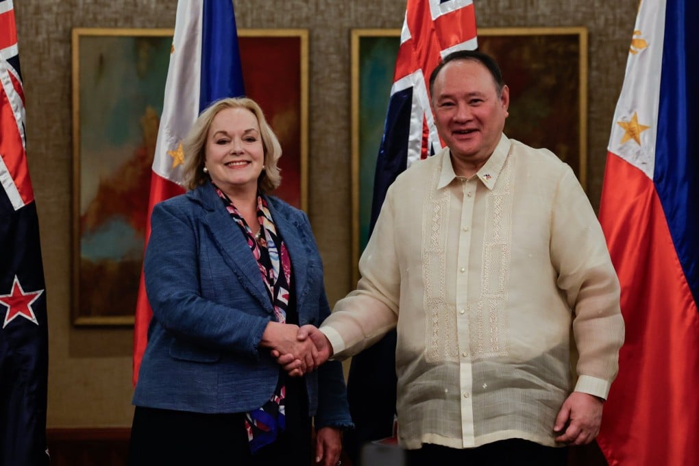New Zealand’s Defence Minister Judith Collins (left) and Philippine Defence Secretary Gilberto Teodoro Jnr shake hands after a bilateral meeting in Metro Manila on April 30. Photo: EPA-EFE