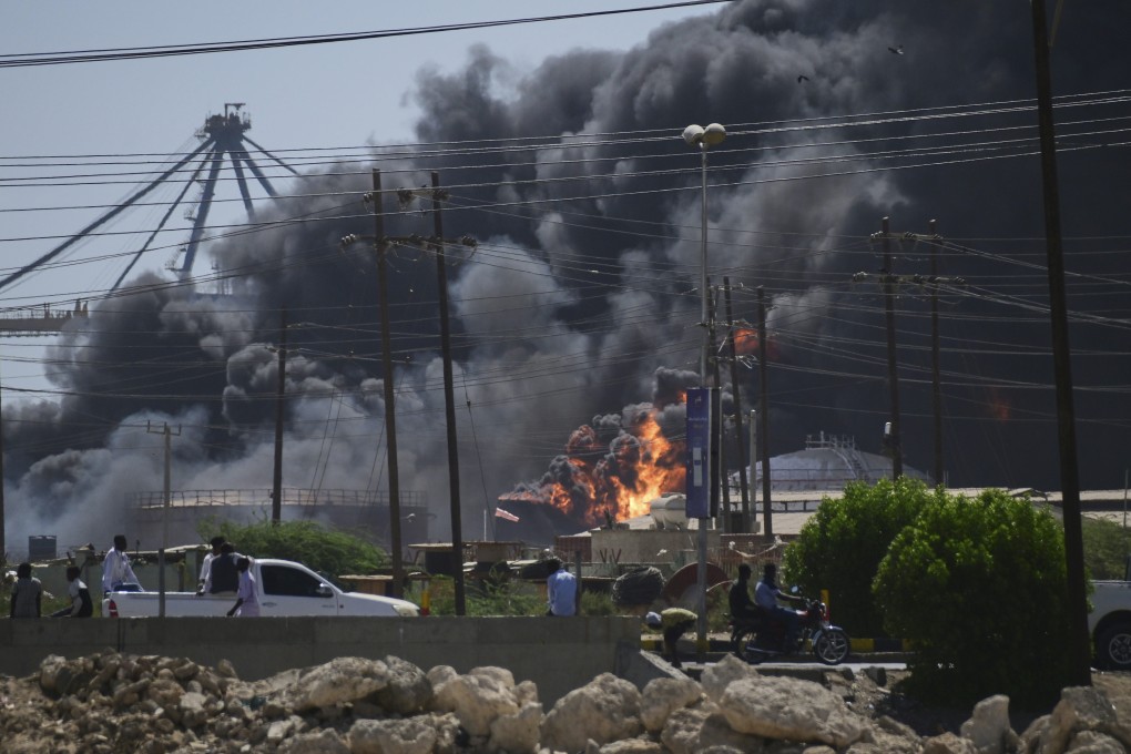 Smoke billows after drone strikes by the paramilitary Rapid Support Forces targeted Port Sudan on Tuesday. Photo: AP