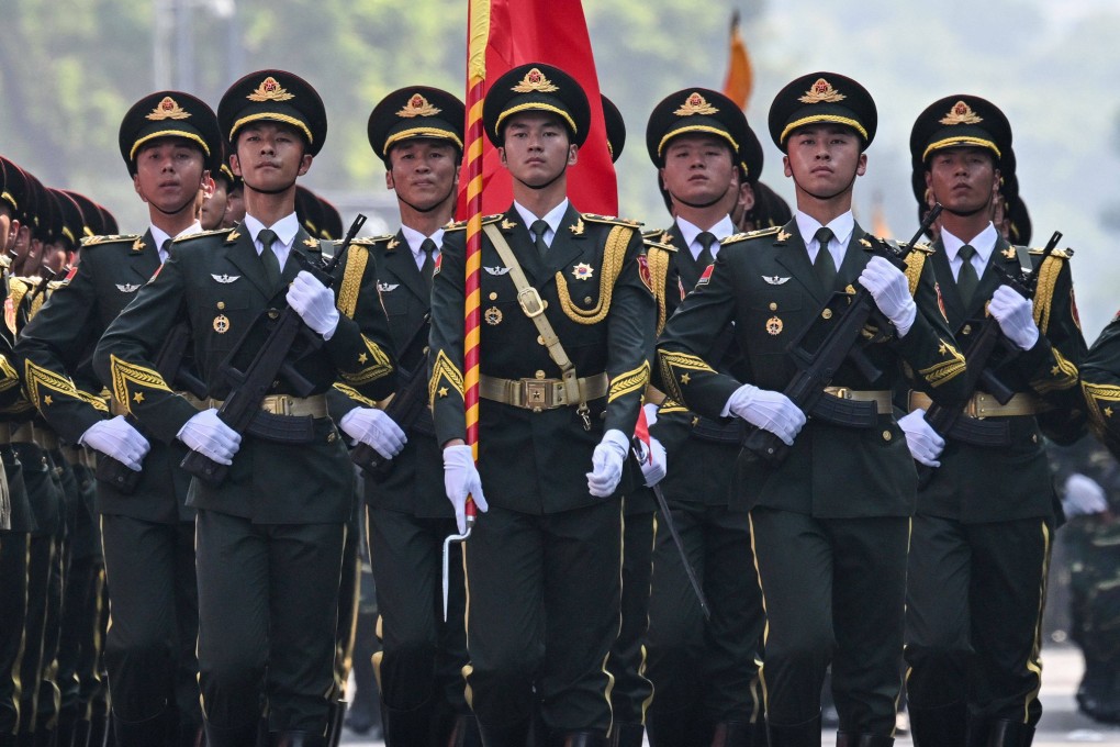 China’s military mouthpiece said the PLA was a strong force for safeguarding national sovereignty and maintaining world peace. Photo: AFP
