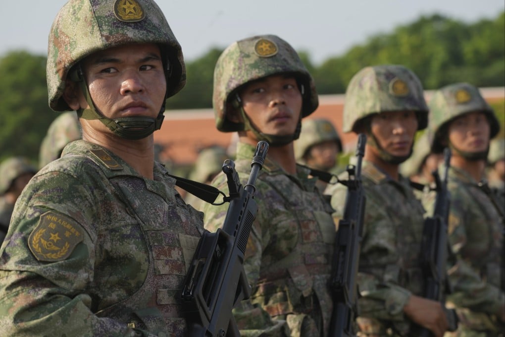 Chinese troops line up during last year’s Golden Dragon military exercise in Kampong Chhnang province, Cambodia on May 16, 2024. Photo: AP