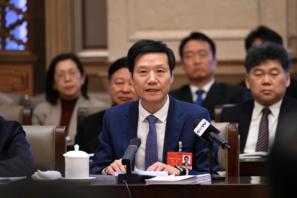 Xiaomi founder and CEO Lei Jun speaks during a meeting in Beijing in March. Photo: AFP