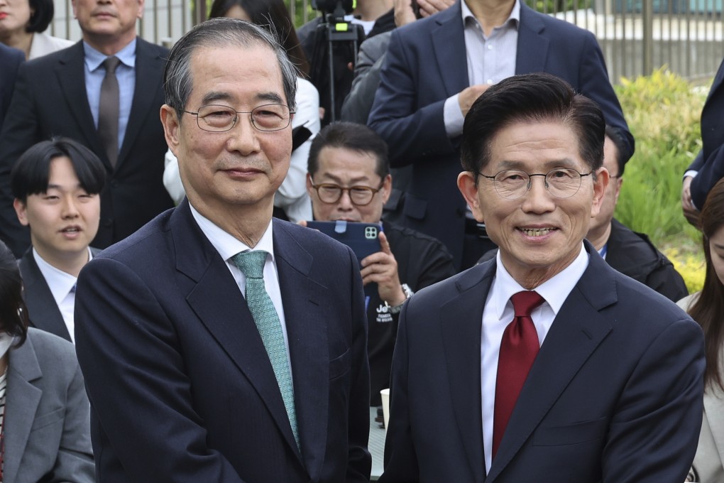 South Korea’s People Power Party’s presidential election candidate Kim Moon-soo (right) had his candidacy nullified in favour of Han Duck-soo. Photo: AP
