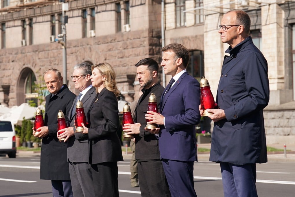 (right to left) German Chancellor Friedrich Merz, French President Emanuel Macron, Ukrainian President Volodymyr Zelensky and his wife Olena Zelenska, Britain’s Prime Minister Keir Starmer, and Poland’s Prime Minister Donald Tusk visit Maidan Square on Saturday. Photo: Reuters