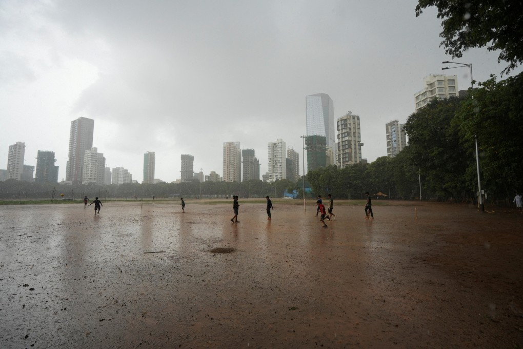 Children play in the rain in Mumbai in June last year. Photo: Reuters