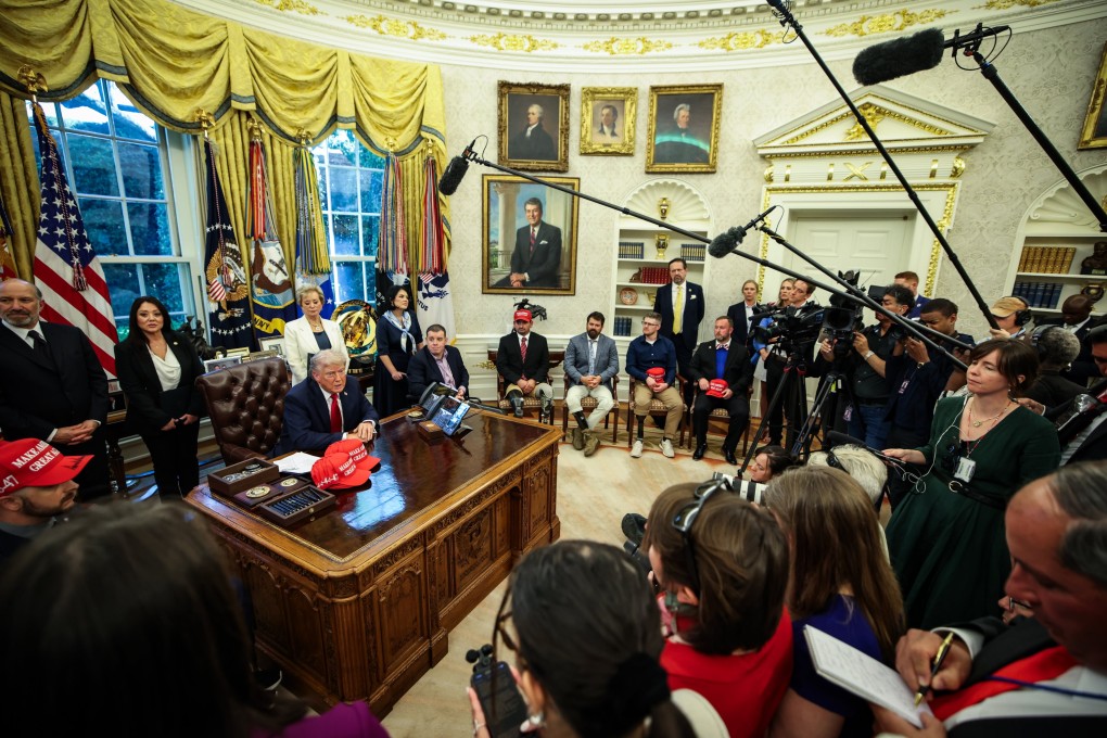 US President Donald Trump answers questions from reporters after signing executive orders, including on AI, in the Oval Office at the White House on April 23. Photo: EPA-EFE
