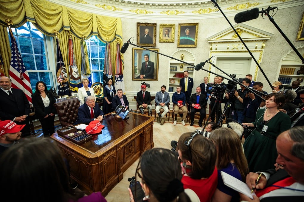 US President Donald Trump answers questions from reporters after signing executive orders, including on AI, in the Oval Office at the White House on April 23. Photo: EPA-EFE