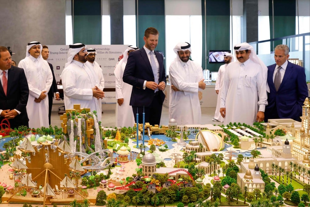 Eric Trump (centre) looks over the proposed real estate project ahead of the signing ceremony with Qatar’s Diar and Dar Global in Doha on April 30. Photo: AFP