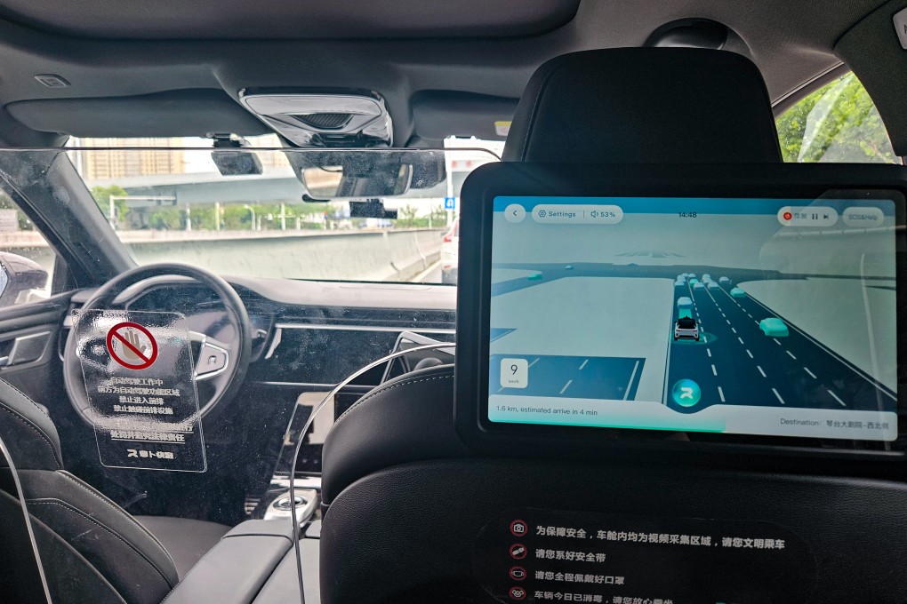 An Apollo Go robotaxi navigates the road in Wuhan, Hubei province, in July last year. Photo: Coco Feng