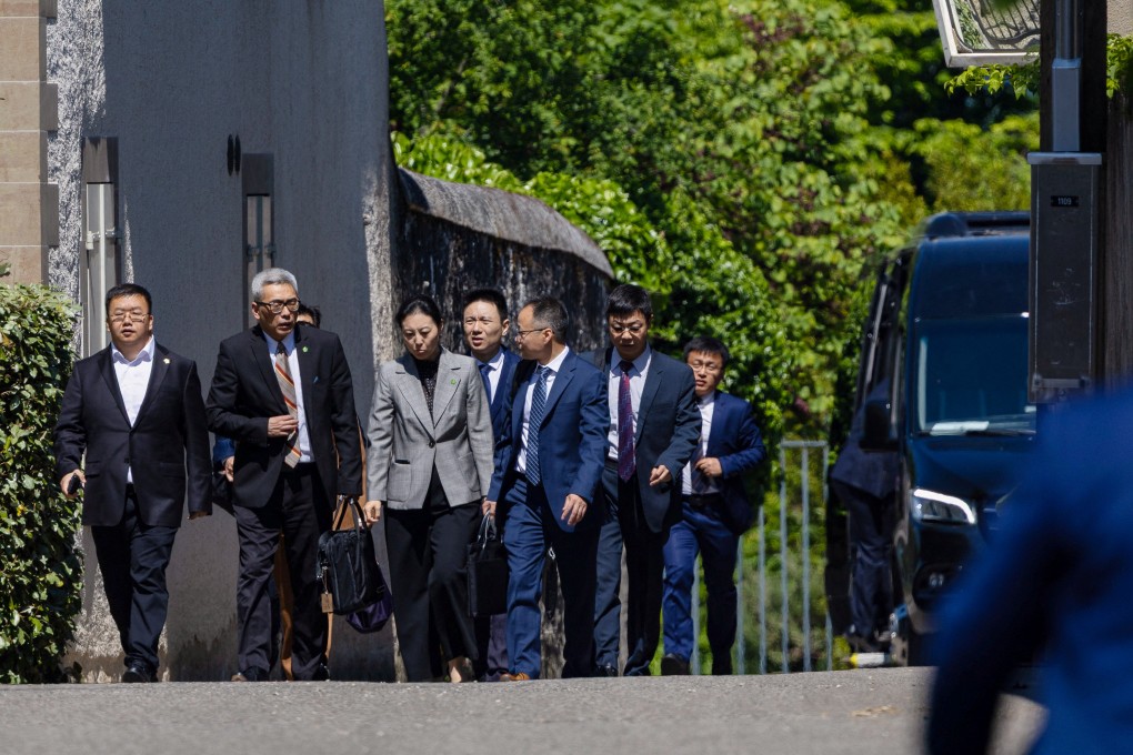 Members of the Chinese delegation leave a residence where trade talks between the US and China are taking place, in Geneva on Saturday. Photo: Reuters