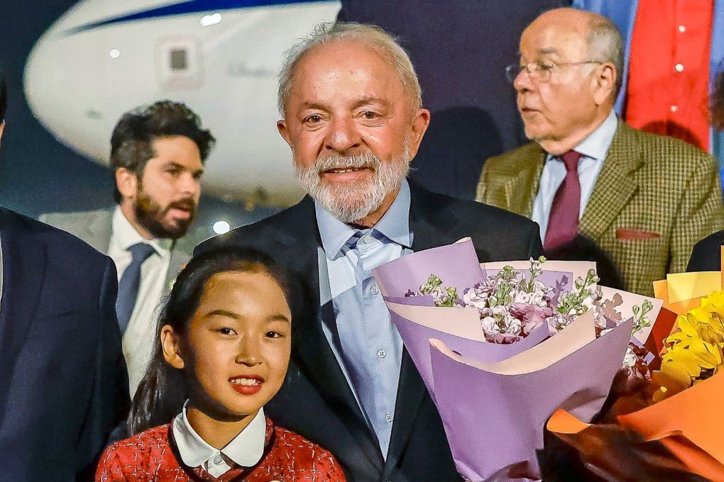 Brazilian President Luiz Inacio Lula da Silva (centre) arrives in China late on Saturday. Photo: Handout