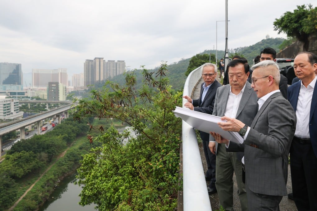 Hong Kong and Macau Affairs Office Director Xia Baolong (second left) and city leader Sam Hou-fai (left) inspect a site earmarked for development. Photo: Handout