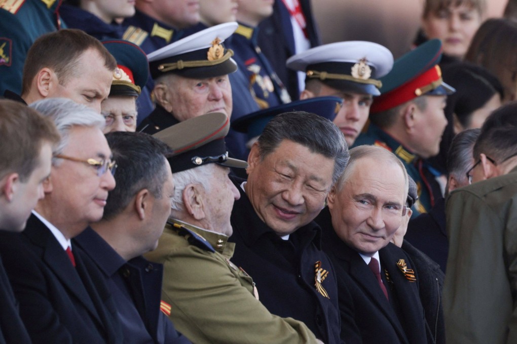 Russian President Vladimir Putin and Chinese President Xi Jinping attend the Victory Day military parade at Red Square in Moscow, on May 9. Photo: AFP