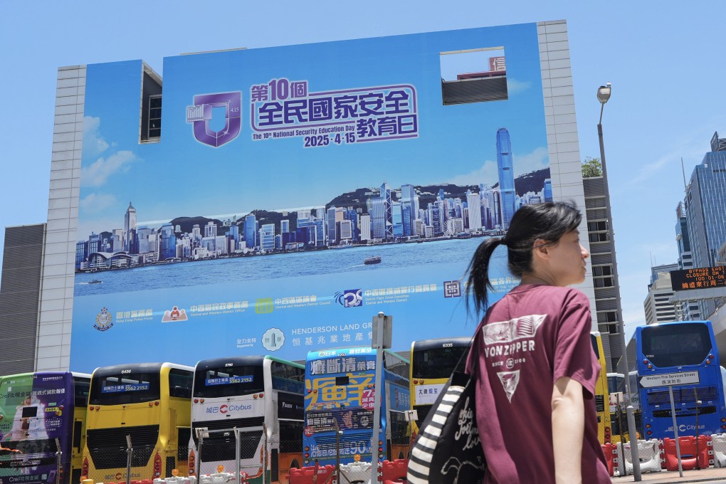 A billboard for National Security Education Day on display in Sheung Wan. Photo: Eugene Lee
