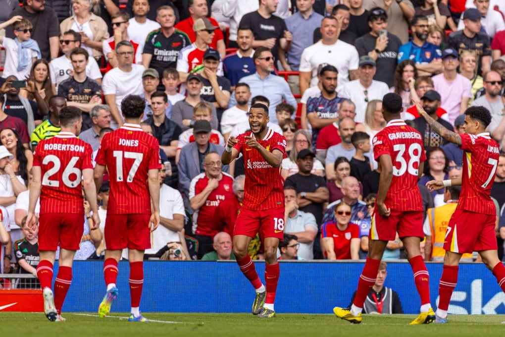 Liverpool’s Cody Gakpo (centre) celebrates after scoring the opening goal in the clash with Arsenal on Sunday. Photo: Xinhua