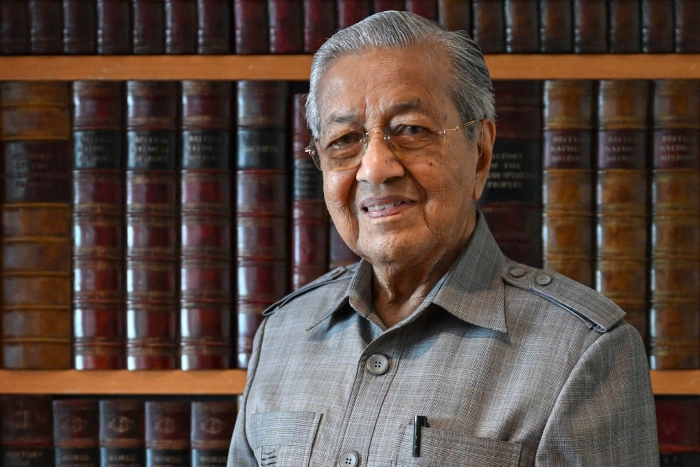 Malaysia’s former prime minister Mahathir Mohamad poses for a picture at his office in Putrajaya. Photo: AFP