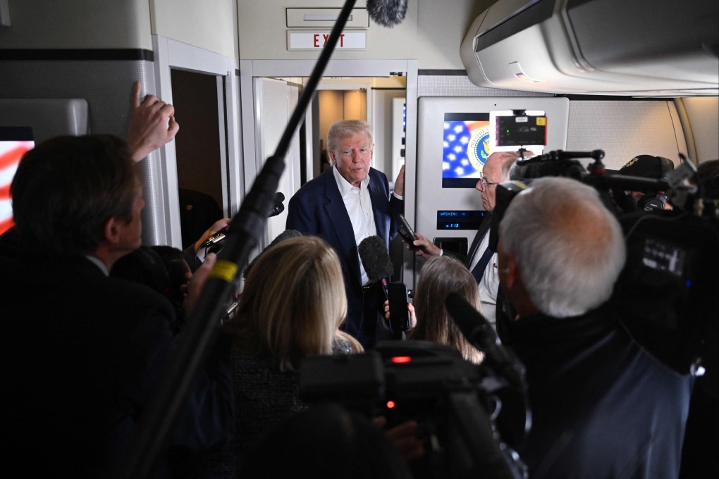 US President Donald Trump aboard Air Force One. Photo: AFP