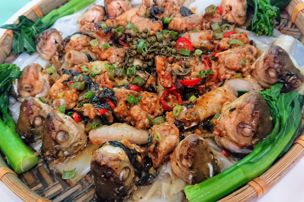 Steamed spare ribs, pork intestines and dace fish heads served on a bed of Chencun flat noodles at Big Happiness Canteen in Beijiao, a town in Shunde, in China’s Guangdong province.