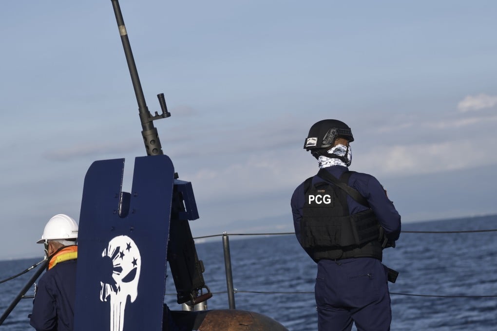 Philippine coastguard (PCG) personnel man the deck of a patrol vessel in Manila Bay last month. Photo: EPA-EFE