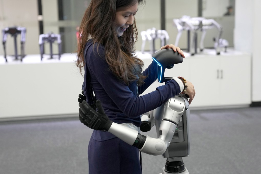 The G1 humanoid robot model from Unitree Robotics gives a hug at the firm’s exhibition hall in Hangzhou, capital of eastern Zhejiang province, on April 23, 2025. Photo: Xinhua