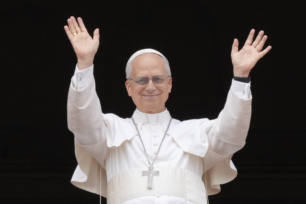 Pope Leo at the central balcony of St Peter’s Basilica for his first Sunday blessing. Photo: AP
