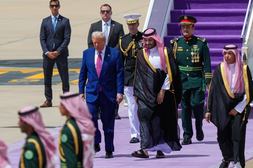 US President Donald Trump is welcomed to Saudi Arabia by Crown Prince Mohammed bin Salman at Riyadh’s airport on Tuesday. Analysts said Washington may pressure Gulf states to scale back their use of the renminbi in future trade negotiations. Photo: AP