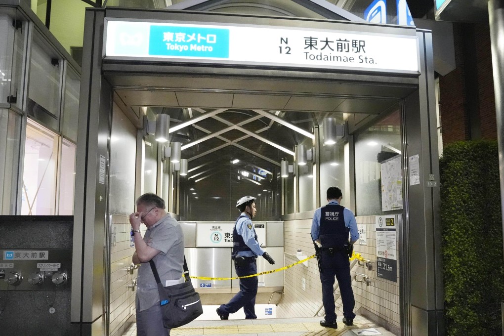 Police guard the Todaimae metro station in Tokyo after a knife attack that injured two people on a platform on May 7. Photo: Kyodo