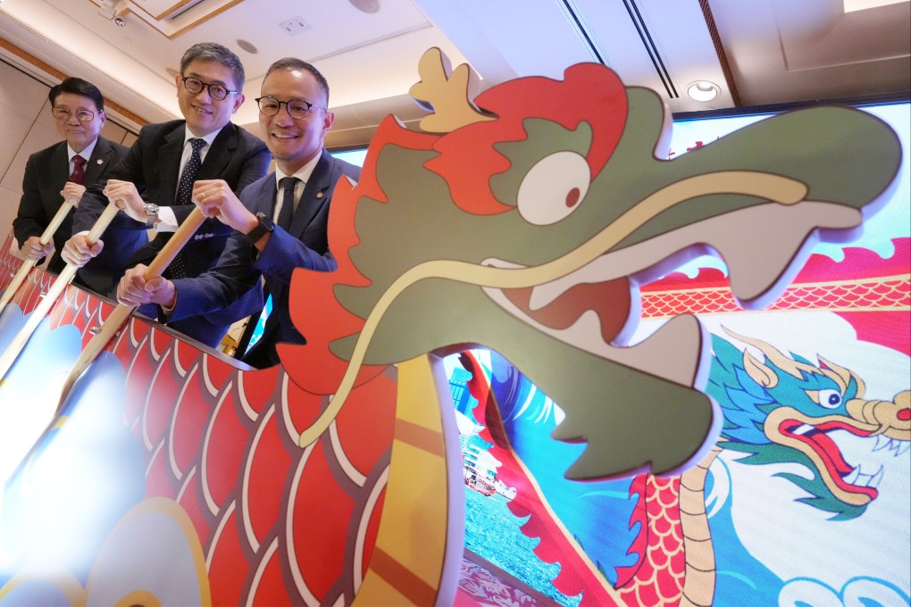 (From left) Kenny Lo, president of the Hong Kong China Dragon Boat Association; Dane Cheng, executive director of the Hong Kong Tourism Board; and Clement Lam, CEO of Sun Life. Photo: May Tse