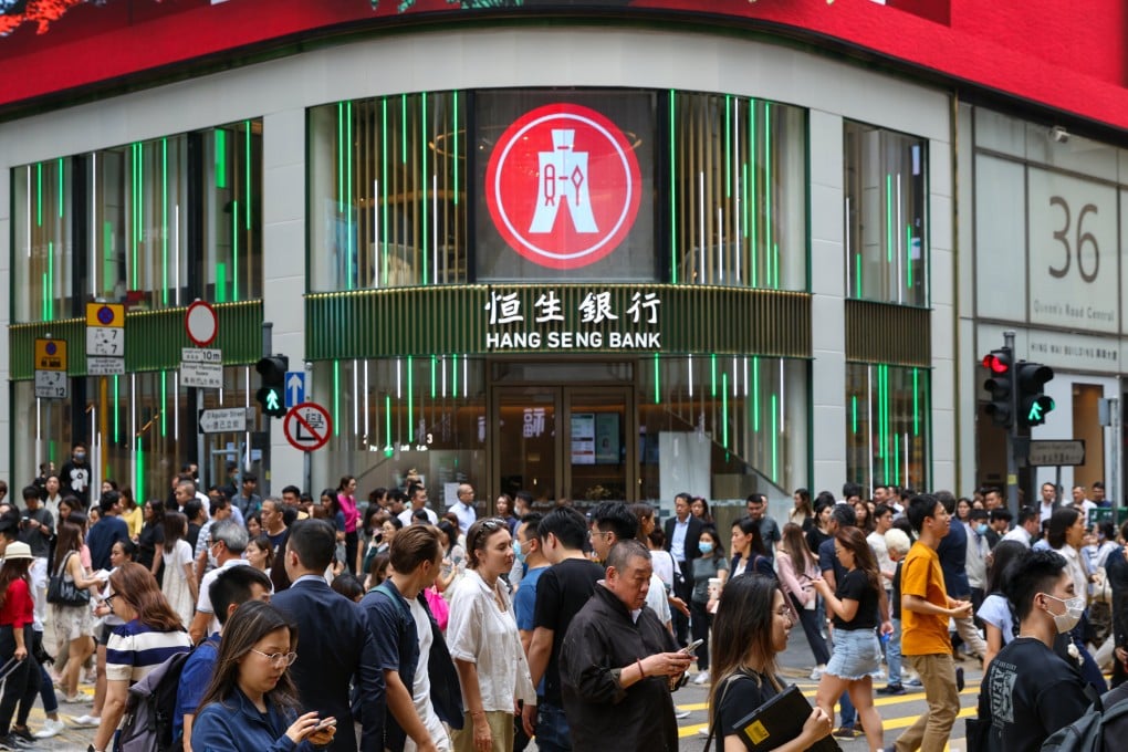 Commuters cross a street in Hong Kong’s Central district on May 17, 2024. Photo: Yik Yeung-man