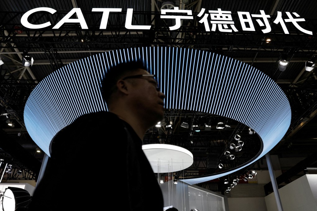 A man walks past CATL’s booth the the Auto China 2024 show in Beijing in 2024. Photo: Reuters