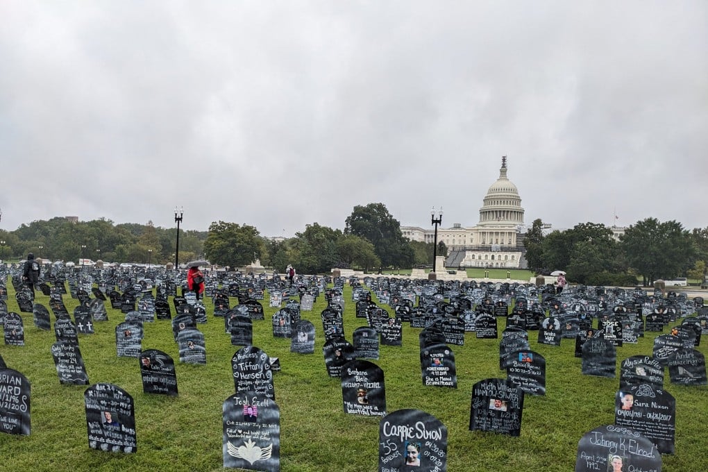 Friends and family who lost loved ones to the overdose crisis place hundreds of cardboard memorial markers near the US Capitol in 2023. Photo: TNS