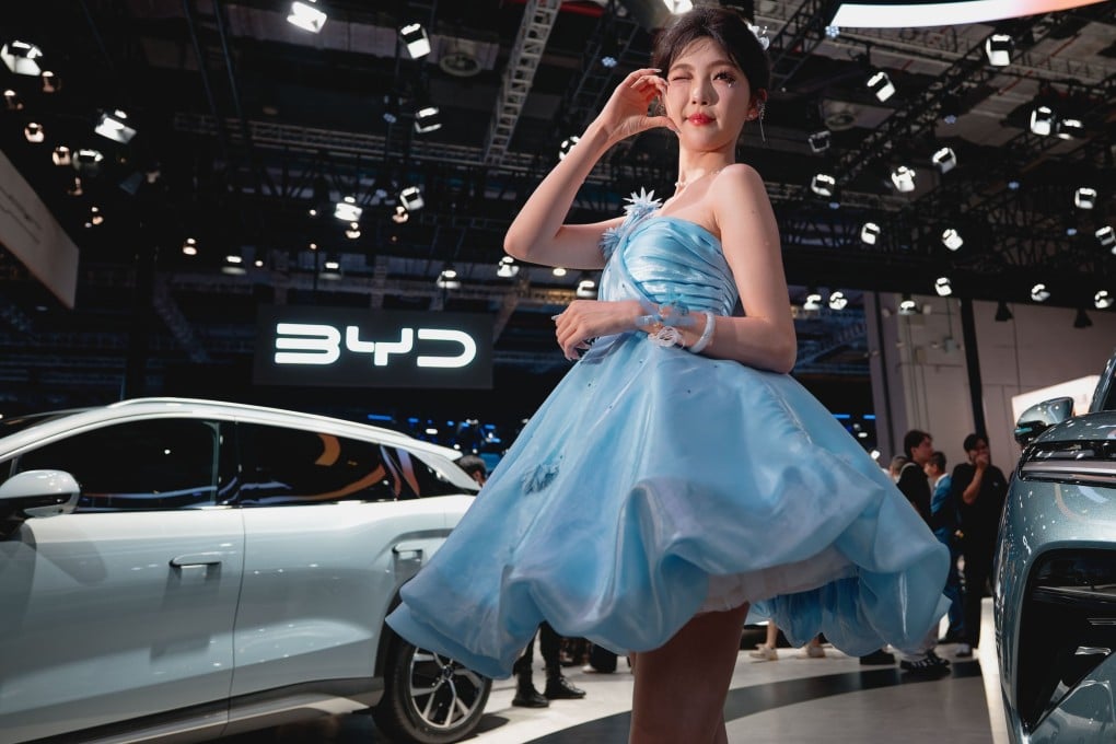 A model poses at the booth of Chinese carmaker BYD at last month’s Auto Shanghai show. Photo: EPA-EFE