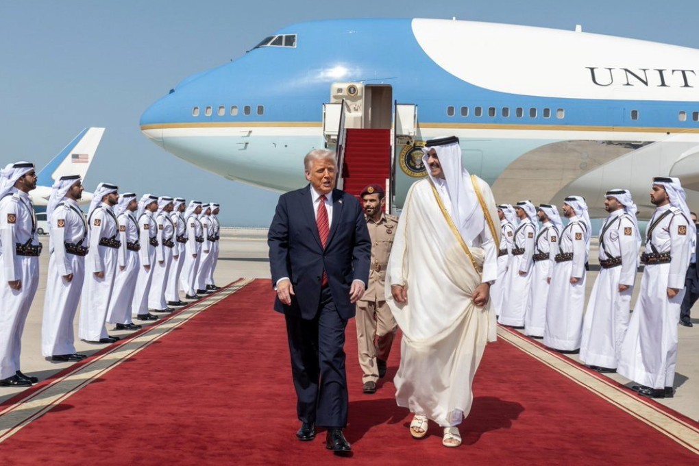 Qatar’s Emir Sheikh Tamim bin Hamad al-Thani welcomes US President Donald Trump upon his arrival in Doha on Wednesday. Photo: Qatar News Agency via EPA-EFE