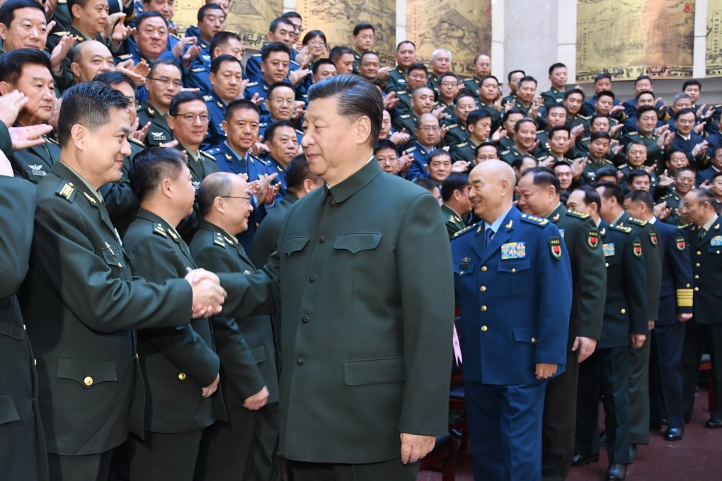 Chinese President Xi Jinping greeting the heads of military academies as well as those working in the military education field attending a training session at the National Defense University in Beijing in 2019. Photo: Xinhua