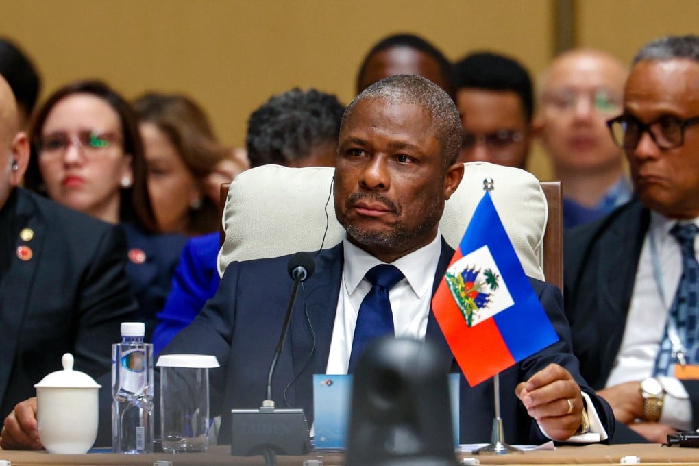 Haiti’s foreign minister Jean-Victor Harvel Jean-Baptiste attends the plenary session of the China-Celac Forum ministerial meeting in Beijing, China on Tuesday. Photo: EPA-EFE