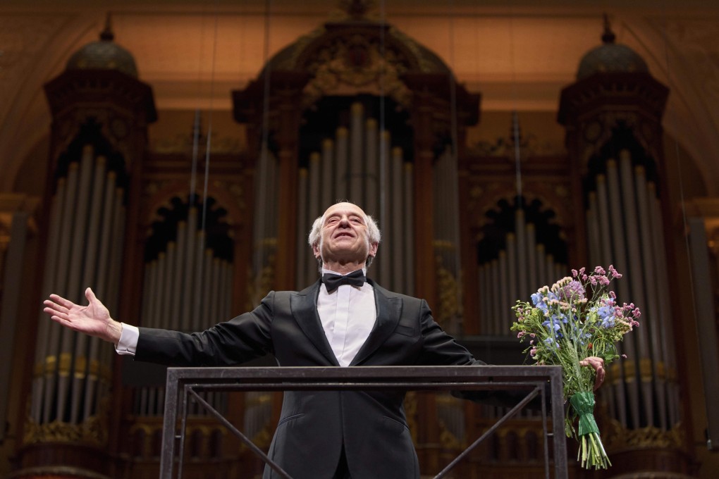 Ivan Fischer acknowledges the audience’s applause after conducting the Budapest Festival Orchestra and the Netherlands Radio Choir in Mahler’s Symphony No 2 in the Concertgebouw in Amsterdam, Netherlands, part of its Gustav Mahler Festival. Photo: AP