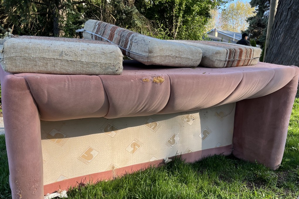Alex Lo’s old sofa, which he refers to as “my pink lady”, pictured out on the curb, waiting to be collected by the rubbish collectors. Photo: Alex Lo