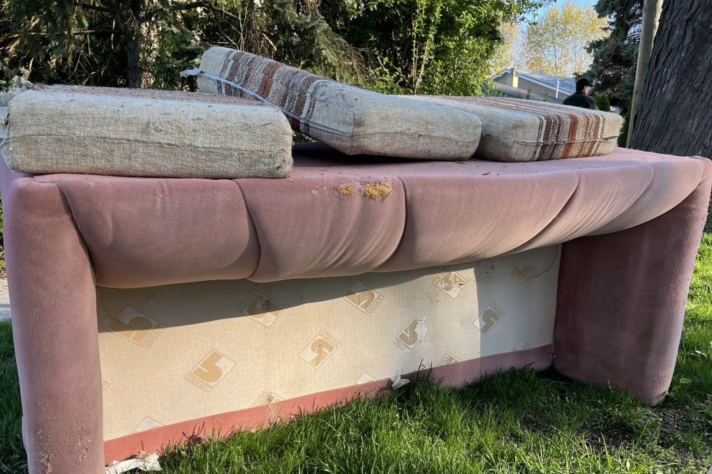 Alex Lo’s old sofa, which he refers to as “my pink lady”, pictured out on the curb, waiting to be collected by the rubbish collectors. Photo: Alex Lo