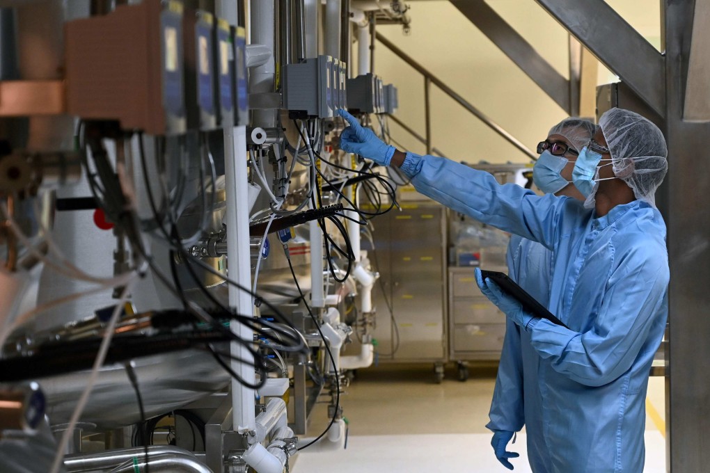 Biochemists at work in Singapore. The country exports many pharmaceutical products to the United States. File photo: AFP
