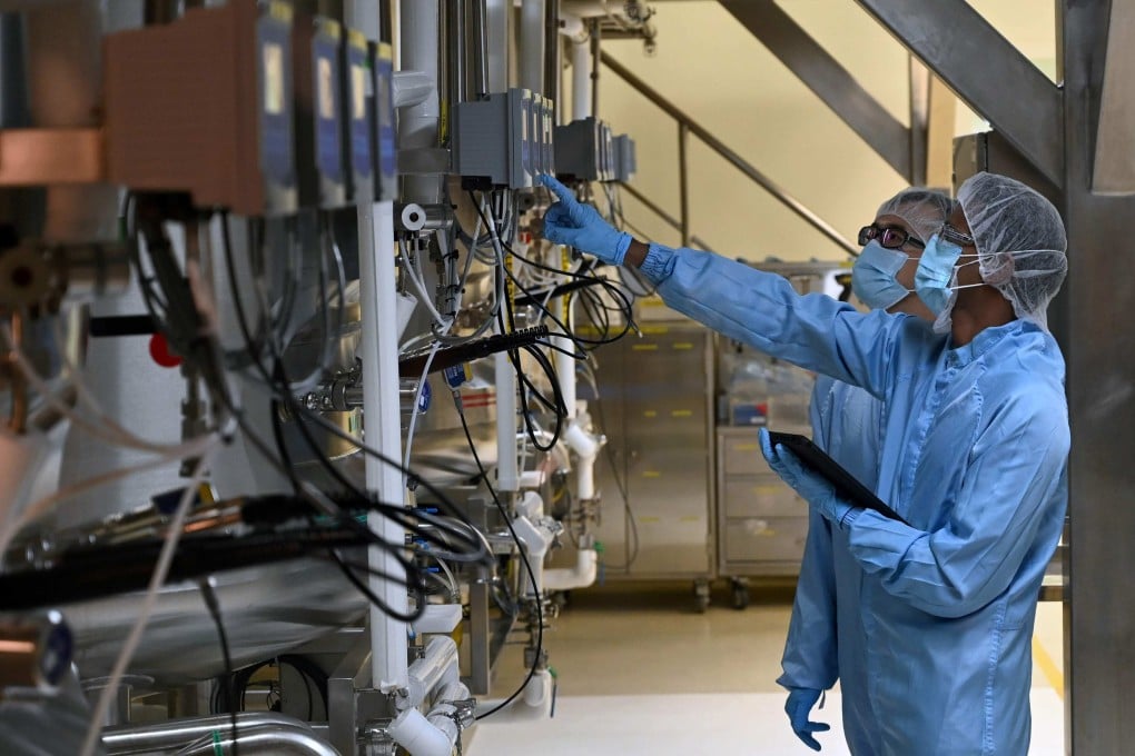 Biochemists at work in Singapore. The country exports many pharmaceutical products to the United States. File photo: AFP
