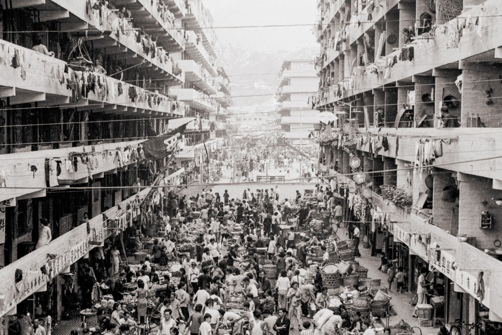 A busy street market in a resettlement estate in Kowloon in 
the 1950s. Photo: Getty Images