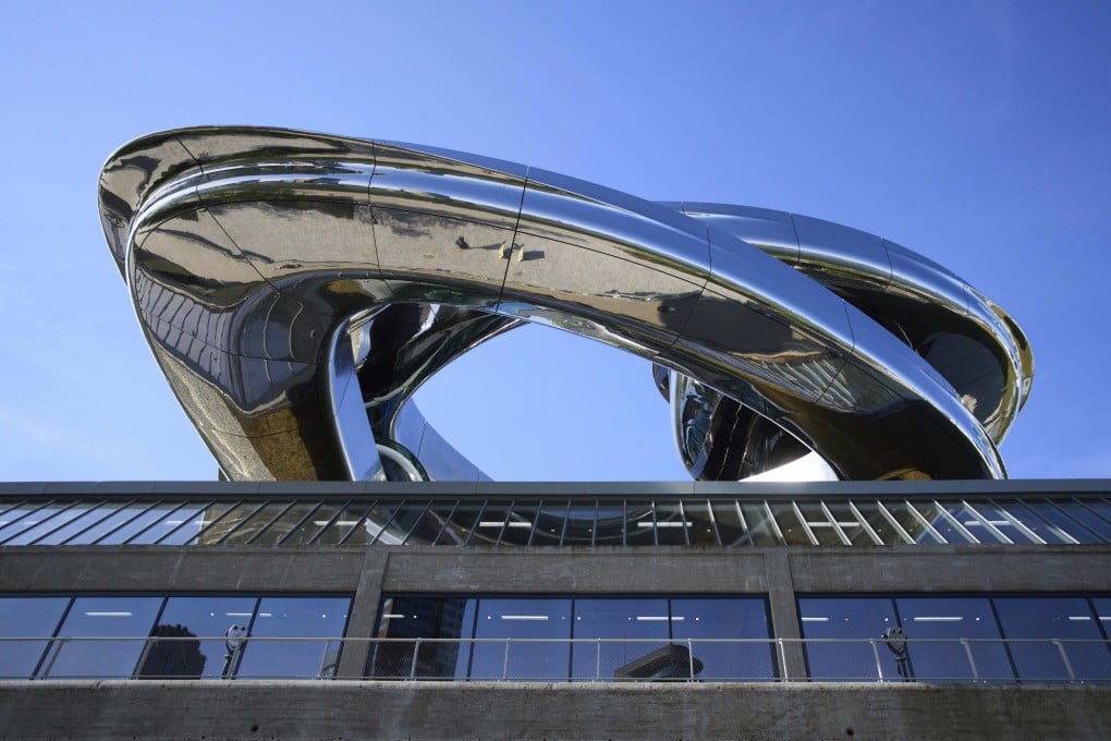 Chinese architect Ma Yansong’s sweeping spiral staircase protrudes from the roof of the Fenix Museum of Migration in Rotterdam, the Netherlands. Photo; AP