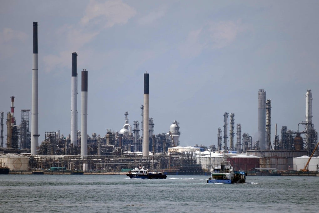 An oil refinery on Pulau Bukom off Singapore. Indonesia imports a large volume of fuel from Singapore due to its lack of refining capacity. Photo: AFP