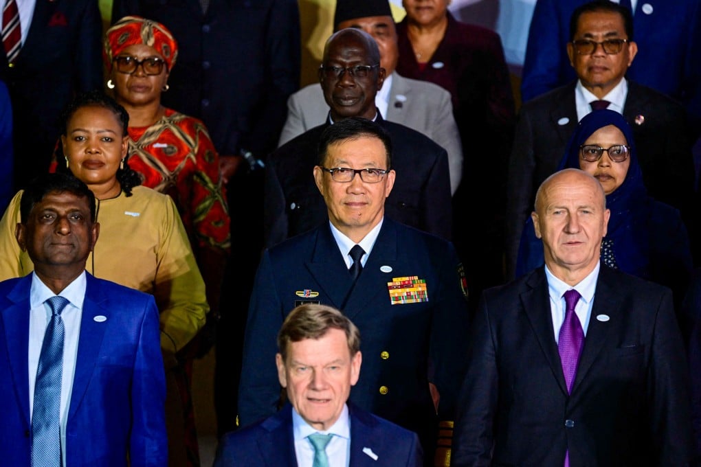 China’s Defence Minister Dong Jun (centre) takes part in a family photo of his fellow state representatives at the UN Peacekeeping Ministerial 2025 in Berlin on Tuesday. Photo: AFP