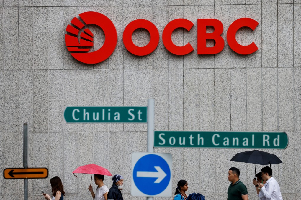 People pass an OCBC bank signage in Singapore. Photo: Reuters
