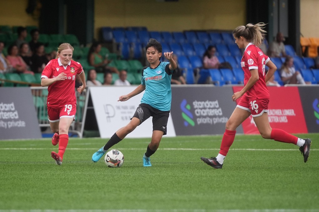 Chonburi FC’s Prakaikan Chanwong (centre) on the ball against Wrexham’s Seren Cashen (left) and Ava Suckley in the Welsh team’s 1-0 win at HKFC Stadium. Photo: Elson Li