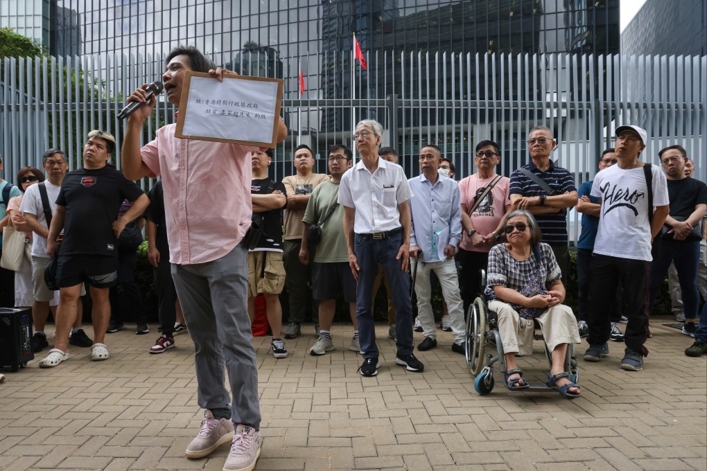 Taxi drivers gather outside government headquarters to petition authorities to take tougher action against illegal ride-hailing services. Photo: Jonathan Wong
