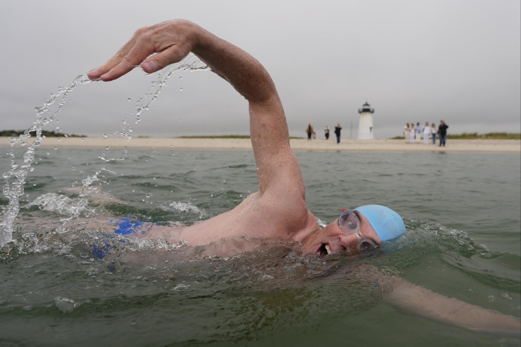 Endurance swimmer Lewis Pugh near the Edgartown Lighthouse at the start of his attempt to swim around Martha’s Vineyard, the island in the US state of Massachusetts where scenes for the film Jaws were shot 50 years ago. On land Pugh, 55, will advocate for sharks. Photo: AP