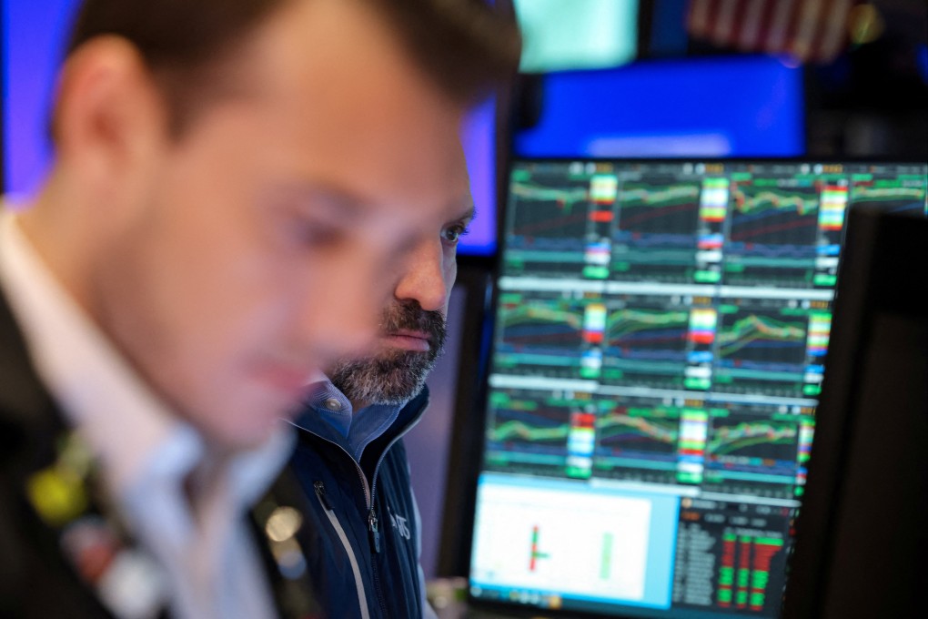 Traders are seen on the floor of the New York Stock Exchange in the US on May 13. Photo: Reuters